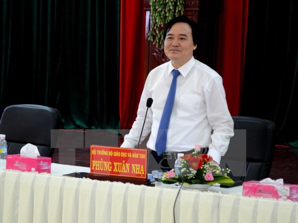 Bộ trưởng Bộ Giáo dục và Đào tạo Phùng Xuân Nhạ. (Ảnh: TTXVN) Bộ Giáo dục đề nghị Hà Tĩnh làm rõ việc điều giáo viên đi tiếp khách ảnh 1