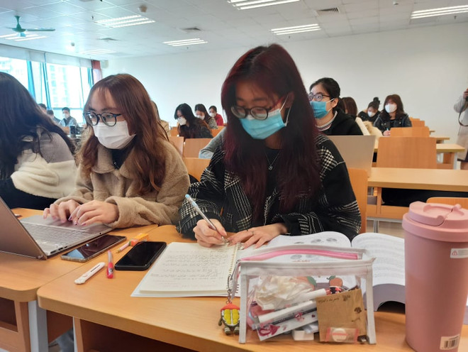 Giờ học của sinh viên Đại học Kinh tế quốc dân. (Ảnh: PM/Vietnam+) Học phí đại học công lập: Chờ nghị quyết mới của Chính phủ ảnh 1