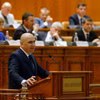 Thủ tướng Romania Ilie Bolojan phát biểu tại phiên họp Quốc hội ở Bucharest ngày 5/5/2026. (Ảnh: THX/TTXVN)