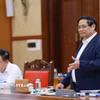 Thủ tướng Phạm Minh Chính làm việc với Ban Thường vụ Tỉnh ủy Tuyên Quang. (Ảnh: Dương Giang/TTXVN)
