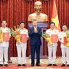 Tổng Bí thư, Chủ tịch nước Tô Lâm trao Quyết định bổ nhiệm chức danh Kiểm sát viên Viện Kiểm sát nhân dân tối cao. (Ảnh: Thống Nhất/TTXVN)