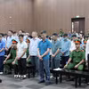 Các bị cáo tại phiên toà xét xử sáng 10/9. (Ảnh: Phạm Kiên/TTXVN)