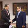 Thủ tướng Phạm Minh Chính tiếp ông Mohamed Arkab, Bộ trưởng Bộ Năng lượng Algeria. (Ảnh: Dương Giang/TTXVN)