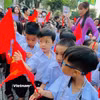 Học sinh cả nước hân hoan trong lễ khai giảng năm học mới. (Nguồn: Vietnam+)