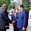 Chủ tịch Quốc hội Trần Thanh Mẫn đón Tổng thống Cộng hòa Nam Phi Matamela Cyril Ramaphosa thăm cấp nhà nước đến Việt Nam. (Ảnh: Doãn Tấn/TTXVN)