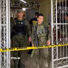 Binh sỹ và cảnh sát Philippines gác tại hiện trường một vụ tấn công. (Ảnh minh họa: AFP/TTXVN)