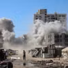 Khói bốc lên sau cuộc không kích của Israel tại Gaza. (Ảnh: THX/TTXVN)