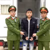 Đối tượng Lò Duy Đông bị bắt giữ. (Ảnh: TTXVN phát)