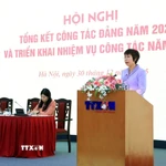 Bà Vũ Việt Trang, Ủy viên Ban Chấp hành Đảng bộ Chính phủ, Bí thư Đảng ủy, Tổng Giám đốc, Chủ tịch Liên Chi hội Nhà báo TTXVN phát biểu. (Ảnh: Tuấn Anh/TTXVN)