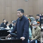 Cựu Cục trưởng Cục An toàn thực phẩm (Bộ Y tế) Nguyễn Thanh Phong tại phiên tòa. (Ảnh: Kim Anh/TTXVN)