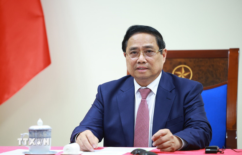 Thủ tướng Phạm Minh Chính điện đàm với Tổng thống Angola João Manuel Gonçalves Lourenço. (Ảnh: Dương Giang/TTXVN)