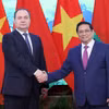 Thủ tướng Phạm Minh Chính và Thủ tướng Cộng hòa Belarus Roman Golovchenko. (Ảnh: Dương Giang/TTXVN)