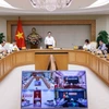Phó Thủ tướng Trần Lưu Quang phát biểu. (Ảnh: Doãn Tấn/TTXVN)
