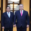 Thủ tướng Phạm Minh Chính và Thủ tướng Hungary Viktor Orbán. (Ảnh: Dương Giang-TTXVN)