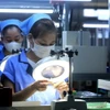 Dây chuyền gia công linh kiện đo lường nhiệt độ. (Ảnh: Tuấn Anh/TTXVN)