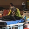 Bệnh nhân COVID-19 được điều trị tại bệnh viện ở New Delhi, Ấn Độ. (Ảnh: AFP/TTXVN)