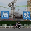 Một công trình xây dựng của Tập đoàn bất động sản Evergrande ở Quảng Châu, tỉnh Quảng Đông, Trung Quốc. (Ảnh: AFP/TTXVN)