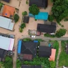 Lũ lụt ảnh hưởng đến hàng nghìn hộ gia đình. (Ảnh: Reuters)
