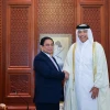 Thủ tướng Phạm Minh Chính hội kiến Chủ tịch Quốc hội Qatar Hassan bin Abdullah Al-Ghanim. (Ảnh: Dương Giang/TTXVN)