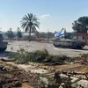 Xe tăng quân đội Israel tiến vào Gaza qua cửa khẩu Rafah ngày 7/5/2024. (Ảnh: THX/TTXVN)