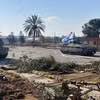 Xe tăng quân đội Israel tiến vào Gaza qua cửa khẩu Rafah ngày 7/5/2024. (Ảnh: THX/TTXVN)