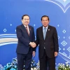 Chủ tịch Đảng Nhân dân Campuchia, Chủ tịch Thượng viện Campuchia Samdech Techo Hun Sen đón Chủ tịch Quốc hội Trần Thanh Mẫn dự Hội nghị. (Ảnh: Doãn Tấn/TTXVN)