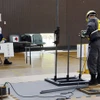Một ứng viên cho chương trình công nhân lành nghề làm bài kiểm tra tại Fujinomiya, tỉnh Shizuoka. (Nguồn: Kyodo)