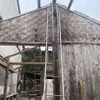 Giông lốc, mưa tại Bắc Kạn khiến nhiều ngôi nhà bị tốc mái. (Ảnh: TTXVN phát)