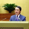 Bộ trưởng, Chủ nhiệm Ủy ban Dân tộc Hầu A Lềnh trình bày Tờ trình. (Ảnh: Phạm Kiên/ TTXVN)