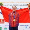 VĐV Nguyễn Thị Hương của Việt Nam giành HCV ở nội dung thuyền đơn nữ Canoeing (WC1 500). Ảnh: Minh Đức – TTXVN