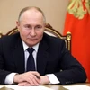 Tổng thống Nga Vladimir Putin tại cuộc họp trực tuyến ở Moskva. (Ảnh: AFP/TTXVN)