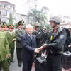 Tổng Bí thư Nguyễn Phú Trọng thăm, kiểm tra công tác sẵn sàng chiến đấu của Bộ Tư lệnh Cảnh sát cơ động (Bộ Công an), ngày 2/1/2016. (Ảnh: Trí Dũng/TTXVN)