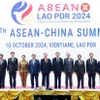 Thủ tướng Phạm Minh Chính cùng Trưởng đoàn các nước ASEAN và Thủ tướng Trung Quốc Lý Cường chụp ảnh chung. (Ảnh: Dương Giang/TXVN)