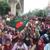 Biểu tình tại thủ đô Dhaka, Bangladesh ngày 4/8. (Ảnh: Getty Images/TTXVN)