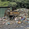 Tại khu vực Nhà máy xử lý rác Bảo Lộc (thôn 2, xã Đại Lào) hiện có hơn 25.000 tấn rác thải ùn ứ, chưa được xử lý. (Ảnh: Nguyễn Dũng/TTXVN)