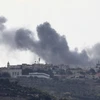Khói bốc lên sau vụ không kích của Israel xuống Alma al-Shaab (Liban), ngày 20/11/2023. (Ảnh: THX/TTXVN)