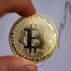 Giá Bitcoin đã vượt ngưỡng 40.000 USD trong phiên giao dịch ngày 4/12. (Ảnh: AFP/TTXVN)