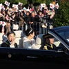 Nhật hoàng Naruhito và Hoàng hậu Masako tại lễ diễu hành ở Tokyo, Nhật Bản, ngày 10/11/2019. (Ảnh: AFP/TTXVN)