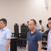 Bị cáo Trần Ngọc Hà (trái) và đồng phạm tại phiên tòa ngày 12/6. (Nguồn: Công an nhân dân)