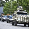 Các lực lượng nghiệp vụ diễu hành biểu dương lực lượng sau Lễ ra quân. (Ảnh: TTXVN phát)