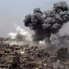 Khói bốc lên sau một vụ không kích tại Mosul, Iraq. (Ảnh: AFP/TTXVN)