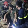 Nạn nhân Tr.V.X (sinh năm 1985, trú xã Hoa Thám, huyện Nguyên Bình, tỉnh Cao Bằng), được các lực lượng tìm kiếm cứu nạn, cứu hộ giải cứu thành công. (Ảnh: Nguyễn Công Hải/TTXVN)