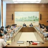 Đại biểu Quốc hội tỉnh Lạng Sơn, Bắc Ninh, Đắk Lắk, Hậu Giang thảo luận tại tổ. (Ảnh: An Đăng/TTXVN)