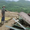Căn nhà bị đổ sập sau lũ dữ tại Thôn làng Nủ, xã Phúc Khánh. (Ảnh: Hồng Ninh/TTXVN)