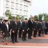 Cán bộ, nhân viên Văn phòng Thủ tướng Lào tưởng niệm Tổng Bí thư Nguyễn Phú Trọng tại Lễ Quốc tang. (Ảnh: Xuân Tú/TTXVN)