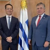 Bộ trưởng Ngoại giao Uruguay Omar Paganini tiếp Đại sứ Việt Nam Dương Quốc Thanh. (Ảnh: Diệu Hương/TTXVN)