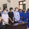 Các bị cáo tại phiên tòa. (Ảnh: Thành Phương/TTXVN phát)