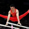 Zou Jingyuan đã xuất sắc bảo vệ thành công tấm huy chương vàng nội dung xà kép. (Nguồn: Olympic Paris)