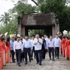 Chủ tịch nước Tô Lâm thăm làng cổ Đường Lâm. (Ảnh: Nhan Sáng/TTXVN)