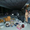 Số động vật hoang dã quý hiếm vận chuyển trái phép bị lực lượng công an phát hiện. (Ảnh: TTXVN phát)